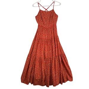 Urban Outfitters woman's maxi dress with adjustable straps.